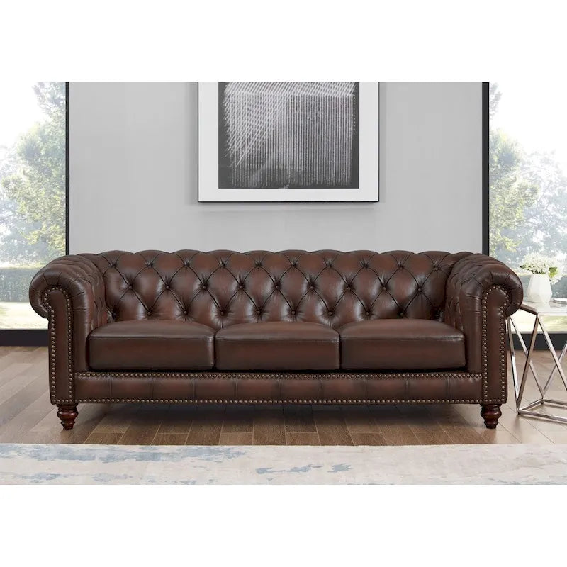 Divano e poltrona Chesterfield in pelle pieno fiore