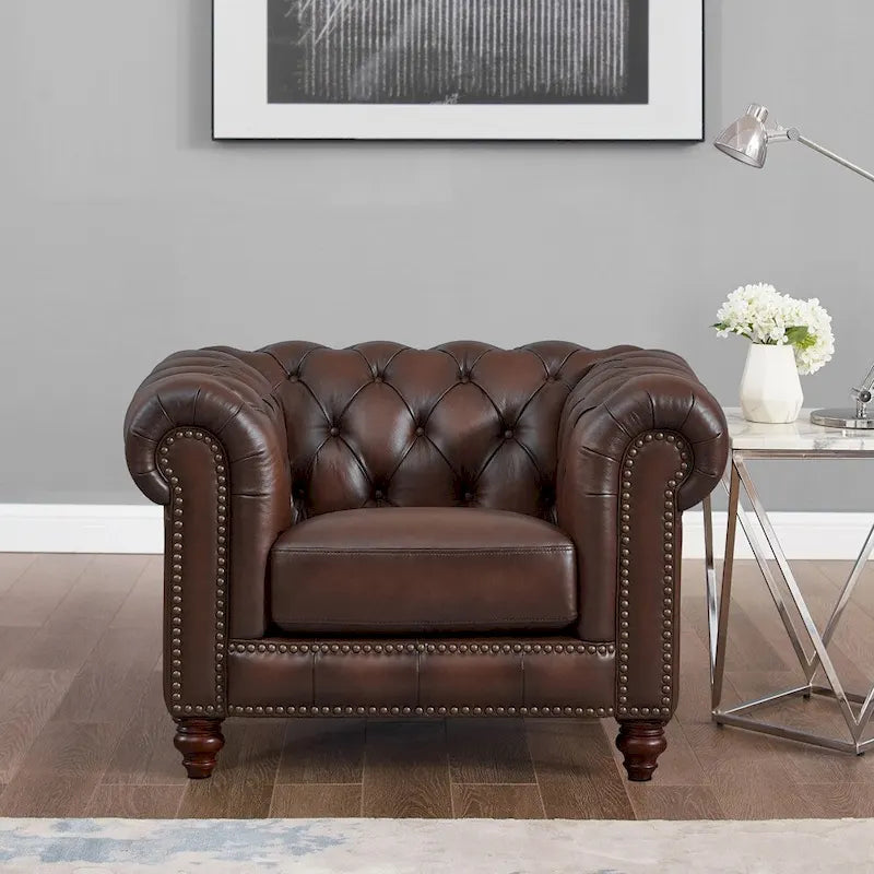 Divano e poltrona Chesterfield in pelle pieno fiore